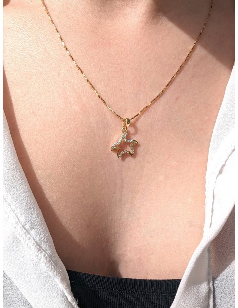 Pendente stella marina in oro con zirconi