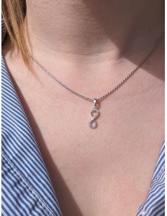 Pendente a infinito in oro bianco con zirconi